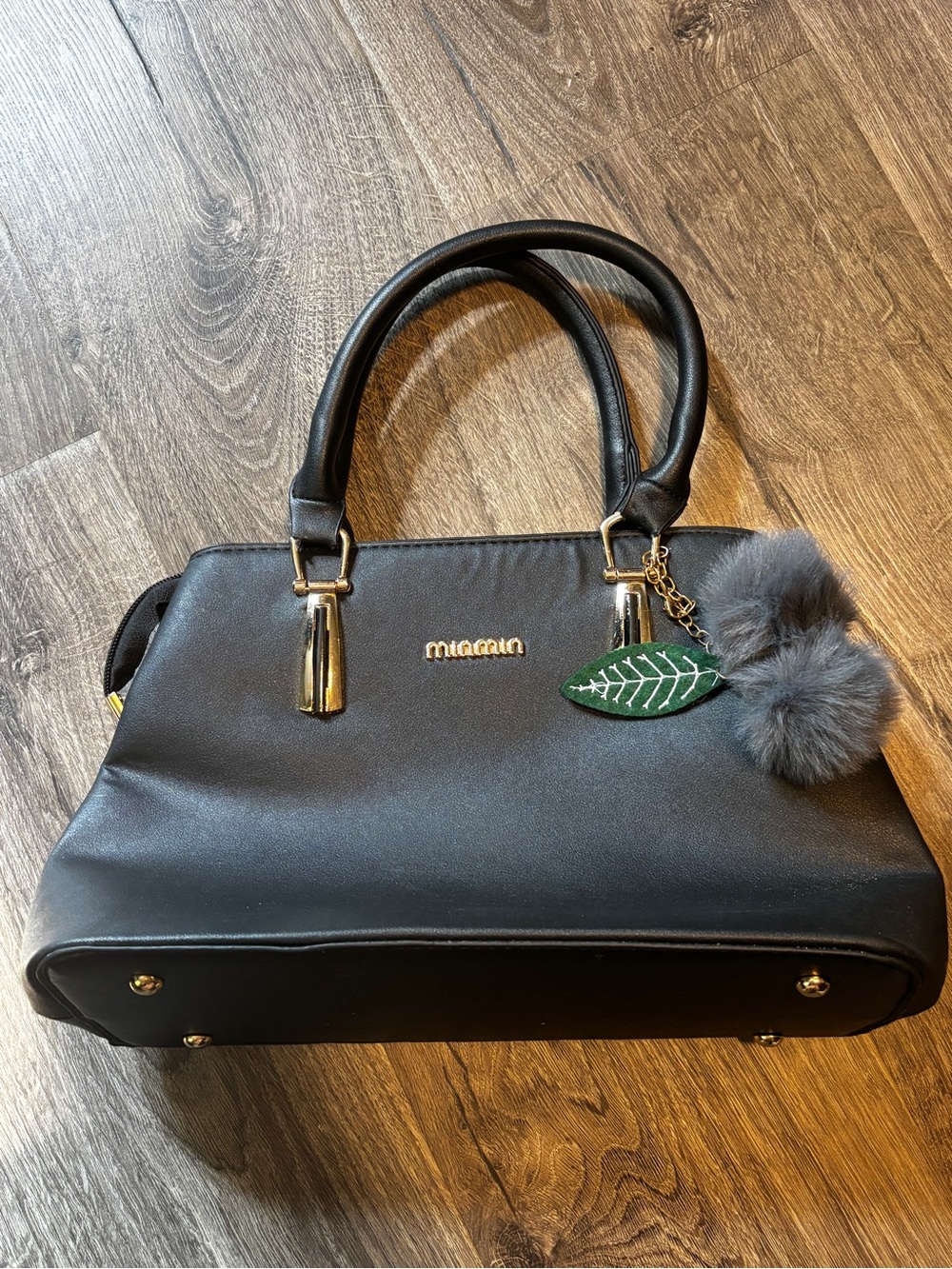 Minmin Black Faux Leather Shoulder Bag with Pom & Leaf Charm